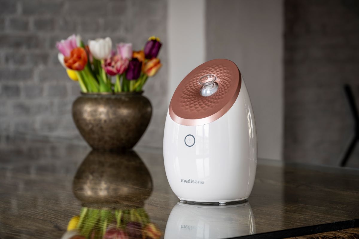 medisana facial sauna in white with a rose-gold top shown as a stylish product image.